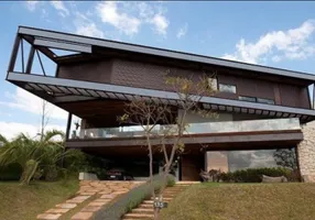 Foto 1 de Casa de Condomínio com 4 Quartos para venda ou aluguel, 950m² em Condominio Vale dos Cristais, Nova Lima