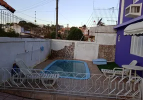 Foto 1 de Casa com 2 Quartos à venda, 100m² em Vila Nova, Porto Alegre
