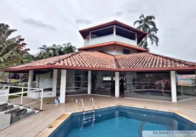 Foto 1 de Casa de Condomínio com 4 Quartos à venda, 314m² em Itaguá, Ubatuba