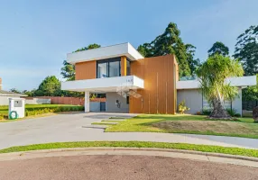 Foto 1 de Casa de Condomínio com 5 Quartos à venda, 321m² em Vila Nova, Porto Alegre