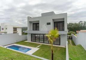 Foto 1 de Casa de Condomínio com 4 Quartos à venda, 396m² em Vila Nova, Porto Alegre