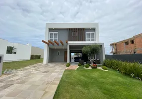 Foto 1 de Casa de Condomínio com 5 Quartos à venda, 180m² em Xangri la, Xangri-lá
