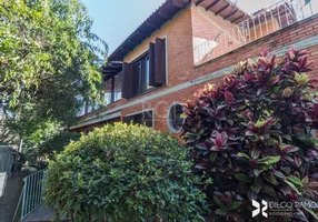 Foto 1 de Casa com 4 Quartos à venda, 348m² em Medianeira, Porto Alegre