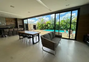 Foto 1 de Casa de Condomínio com 4 Quartos à venda, 340m² em Jardim Botânico, Uberlândia