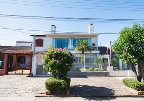 Foto 1 de Casa com 4 Quartos à venda, 234m² em Santa Maria Goretti, Porto Alegre