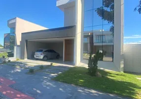 Foto 1 de Casa de Condomínio com 4 Quartos à venda, 228m² em Manguinhos, Serra