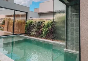 Foto 1 de Casa com 3 Quartos à venda, 236m² em Alphaville, Uberlândia