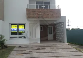 Foto 1 de Sobrado com 3 Quartos à venda, 144m² em Aberta dos Morros, Porto Alegre