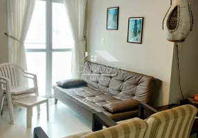 Foto 1 de Apartamento com 2 Quartos à venda, 67m² em Praia das Pitangueiras, Guarujá