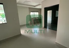 Foto 1 de Casa com 3 Quartos à venda, 170m² em Santa Mônica, Uberlândia