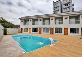 Foto 1 de Casa de Condomínio com 2 Quartos à venda, 160m² em Massaguaçu, Caraguatatuba