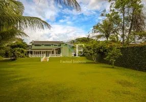 Foto 1 de Casa de Condomínio com 4 Quartos à venda, 237m² em Balneário Praia do Pernambuco, Guarujá