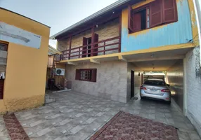 Foto 1 de Casa com 3 Quartos à venda, 100m² em Vila Nova, Porto Alegre
