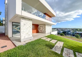 Foto 1 de Casa de Condomínio com 4 Quartos à venda, 420m² em Encosta do Sol, Estância Velha