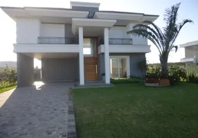 Foto 1 de Casa de Condomínio com 4 Quartos à venda, 300m² em Capao Novo, Capão da Canoa