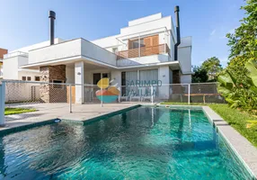 Foto 1 de Casa de Condomínio com 4 Quartos à venda, 280m² em Lagoa da Conceição, Florianópolis