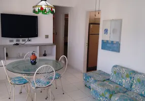 Foto 1 de Apartamento com 2 Quartos à venda, 63m² em Praia das Pitangueiras, Guarujá