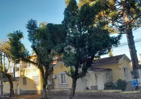 Foto 1 de Casa com 4 Quartos à venda, 236m² em Santo Antônio, Porto Alegre