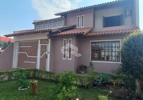 Foto 1 de Casa com 4 Quartos à venda, 194m² em Estância Velha, Canoas