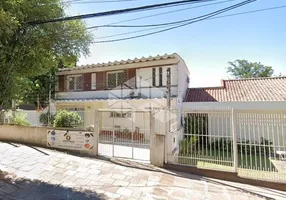 Foto 1 de Casa com 3 Quartos à venda, 300m² em Três Figueiras, Porto Alegre