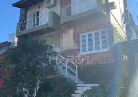 Foto 1 de Casa de Condomínio com 4 Quartos à venda, 300m² em Espiríto Santo, Porto Alegre