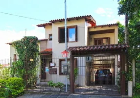 Foto 1 de Casa de Condomínio com 3 Quartos à venda, 235m² em Tristeza, Porto Alegre
