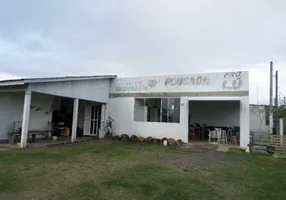 Foto 1 de Casa com 4 Quartos à venda, 600m² em Courhasa, Imbé