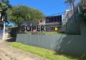 Foto 1 de Sobrado com 6 Quartos à venda, 315m² em Vila Assunção, Porto Alegre