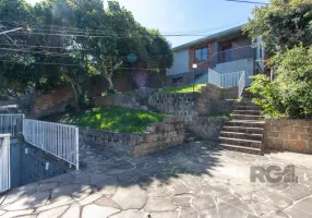 Foto 1 de Casa com 4 Quartos à venda, 180m² em Medianeira, Porto Alegre