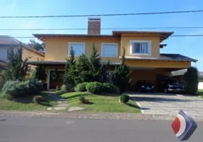 Foto 1 de Casa de Condomínio com 4 Quartos à venda, 453m² em Belém Novo, Porto Alegre