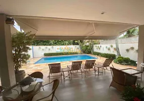 Foto 1 de Casa com 7 Quartos à venda, 324m² em Enseada, Guarujá