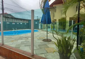 Foto 1 de Casa de Condomínio com 2 Quartos à venda, 69m² em Vila Guilhermina, Praia Grande