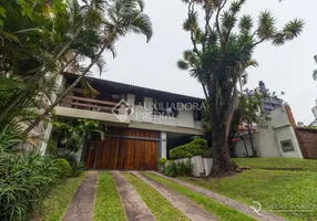 Foto 1 de Casa com 4 Quartos à venda, 440m² em Bela Vista, Porto Alegre