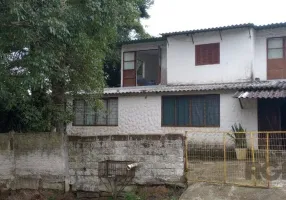 Foto 1 de Casa com 5 Quartos à venda, 199m² em Camaquã, Porto Alegre