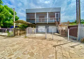 Foto 1 de Casa com 4 Quartos à venda, 309m² em Marechal Rondon, Canoas