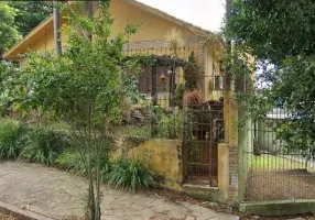 Foto 1 de Casa com 4 Quartos à venda, 376m² em Santa Fé, Porto Alegre