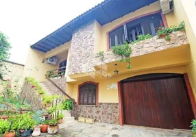 Foto 1 de Casa com 2 Quartos à venda, 155m² em Passo da Areia, Porto Alegre