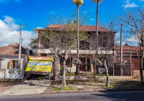 Foto 1 de Sobrado com 4 Quartos à venda, 356m² em Jardim Itú Sabará, Porto Alegre