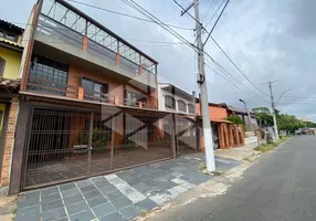 Foto 1 de Casa com 4 Quartos para alugar, 360m² em Partenon, Porto Alegre