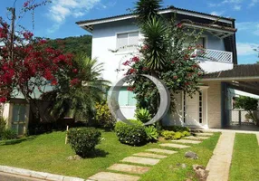 Foto 1 de Casa de Condomínio com 5 Quartos à venda, 285m² em Balneário Praia do Pernambuco, Guarujá