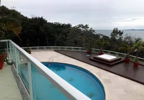 Foto 1 de Casa de Condomínio com 6 Quartos à venda, 907m² em Praia do Estaleiro, Balneário Camboriú