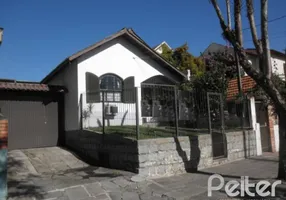 Foto 1 de Casa com 5 Quartos à venda, 206m² em Camaquã, Porto Alegre