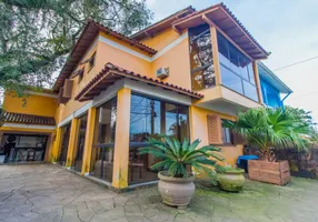 Foto 1 de Casa com 4 Quartos à venda, 261m² em Santa Isabel, Viamão