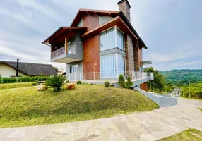 Foto 1 de Casa com 5 Quartos à venda, 348m² em Vivendas do Arvoredo, Gramado