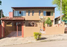 Foto 1 de Casa com 4 Quartos à venda, 270m² em Cavalhada, Porto Alegre