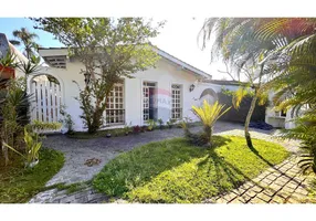 Foto 1 de Casa de Condomínio com 4 Quartos à venda, 158m² em Balneário Praia do Perequê , Guarujá