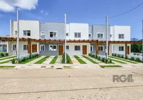 Foto 1 de Casa de Condomínio com 3 Quartos à venda, 92m² em Campo Novo, Porto Alegre