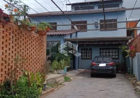 Foto 1 de Casa com 3 Quartos à venda, 220m² em Cristo Redentor, Porto Alegre