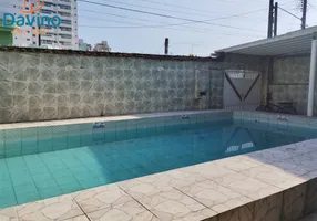 Foto 1 de Sobrado com 6 Quartos à venda, 297m² em Jardim Real, Praia Grande