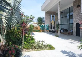 Foto 1 de Casa de Condomínio com 4 Quartos à venda, 360m² em Jardim Carolina, Ubatuba